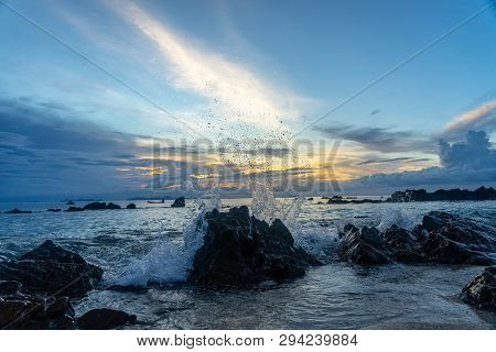 Thailand Sunset On The Beach Ocean Crashing On The Rocks