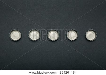 Used Caps From Alcoholic Beverages. Alcoholism, Drunkenness.