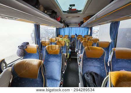 Bus interior empty seats, stop on a long distance trip