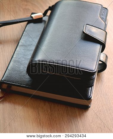Purse With Notebook At Home For Business