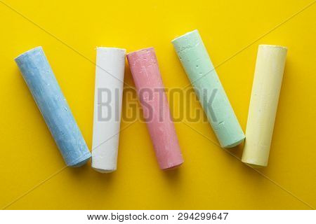 Abstract Colorful Chalks Over Yellow Background. Education Template. Creative Childhod, Business Con
