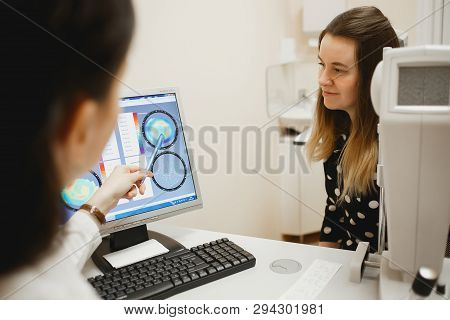 Arkhangelsk, Russia - March 25, 2019: Attractive Female Doctor Ophthalmologist Is Checking The Eye V