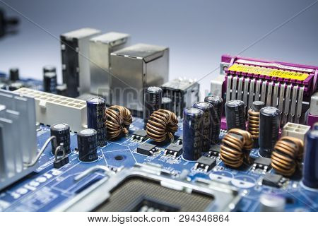 Zelenodolsk, Ukraine. 5.01.2019. The Old Motherboard From The Computer Of Blue Color. Texture. Spare