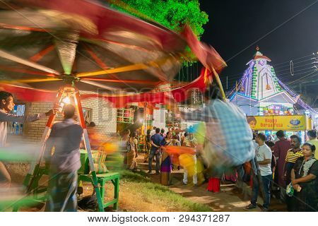 Howrah,west Bengal,india -april 15th, 2018 : Children Are Riding On Nagordola- A Traditional Amuseme