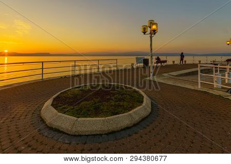 Sunset View Of The Sea Of Galilee (kinneret Lake), From Ein Gev, With Swimming Forbidden Sign And Si