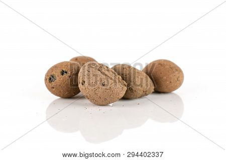 Group Of Five Whole Brown Clay Pebbles (leca) Isolated On White Background