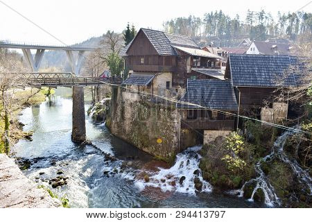 Rastoke, Croatia - March 7 2019: Bridge Over River Leading To Old Town