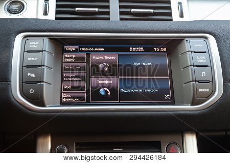 Novosibirsk, Russia - 03.10.2019: View To The Interior Of Land Rover Evoque With Dashboard, Clock, M