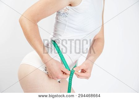 Woman Body After Weight Loss. Cropped Close Up Photo Of Fatless Slender Body Parts And Proportions W