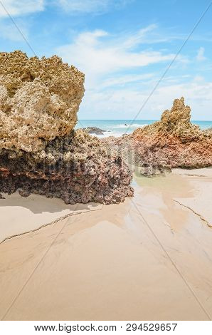 View Of Praia De Tambaba Beach, Costa Do Conde. Rock Formations On The Beach. Beautiful Brazilian No