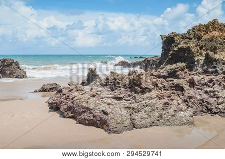 View Of Praia De Tambaba Beach, Costa Do Conde. Rock Formations On The Beach. Beautiful Brazilian No