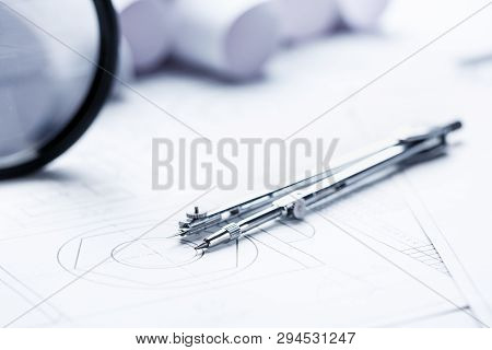 The Circulars Are On The Drawings In The Background Of The Rolls With Drawings