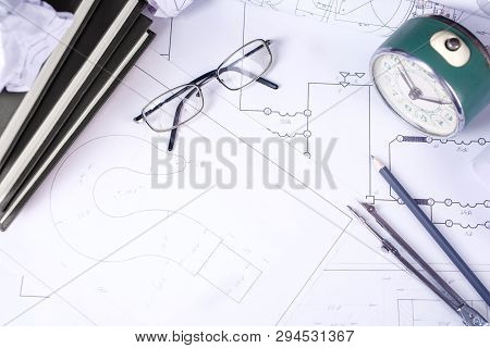Rolls With Drawings, Design Books And Several Drawing Tools