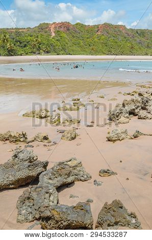 Conde - Pb, Brazil - February 22, 2019: Local People And Tourists At Praia De Coqueirinho Beach, Cos