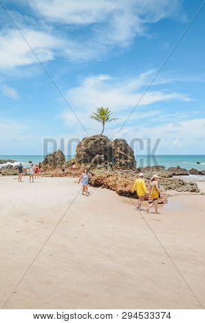 Conde - Pb, Brazil - February 22, 2019: Tourists Visiting The Praia De Tambaba Beach, Costa Do Conde