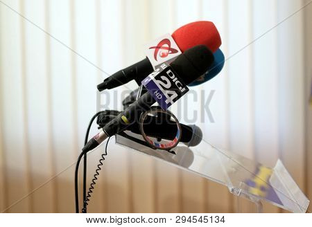Bucharest, Romania - September 09, 2018: A microphone of the Romanian television Digi 24 and one from Realitatea TV are seen before a press release. This image is for editorial use only.