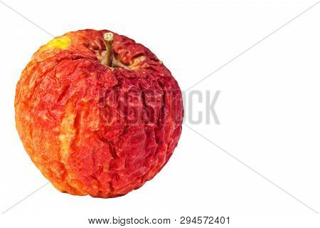 Wrinkled Apple Texture With White Background. Shriveled Apple. Old Apple. Isolated On White.