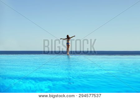 Young Woman Feel Freedom And Enjoying Relaxationin Infinity Pool , Travel And Leisure, Vacation Retr