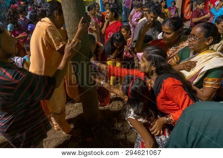 Howrah,west Bengal, India - April 15th, 2018 : Women Praying To Wood - During Gajan And Charak Puja-