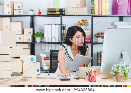 Portrait Of Young And Beautiful Asian Business Lady In Casual Fashion Dress Preparing Various Packag