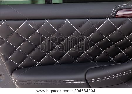 Interior Of A Luxury Car With Leather Interior Overtightened Stitching In The Form Of A Diamond Of W