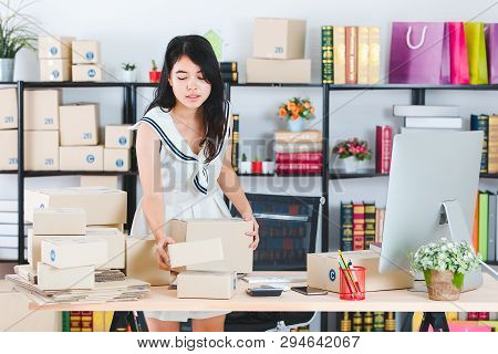 Portrait Of Young And Beautiful Asian Business Lady In Casual Fashion Dress Preparing Various Packag