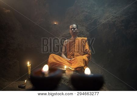 The Meditation Monk To Follow The Teachings Of The Lord Buddha In The Cave In Thailand.