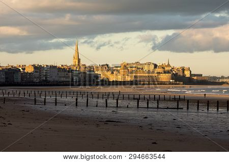 The Morning Light On The Plage Du Sillon And Walled City. Saint Malo , France, Ille Et Vilaine, Emer