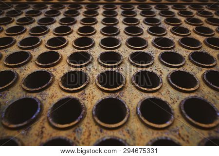 Rust Tube Sheet Of The Heat Exchanger For Maintenance, The Water Heater In The Boiler As Background
