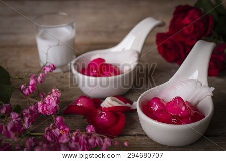 Thapthim Krop, Mock Pomegranate Seeds In Coconut And Syrup In The White Spoon Bowl On The Wood Table