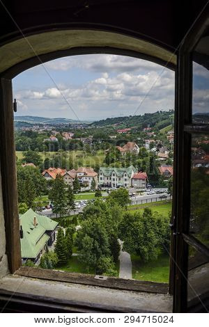 Bran City Framed In A Window. Bran With Traditional Houses