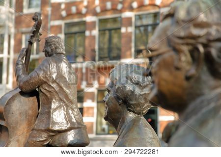 Amsterdam, Netherlands - April 05, 2019: Bronze Sculptures Of Famous Dutch Musicians And Singers (jo