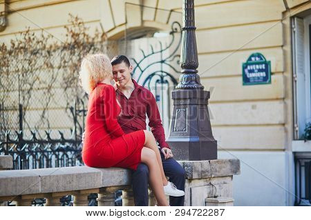 Romantic Couple In Love Kising On A Parisian Street