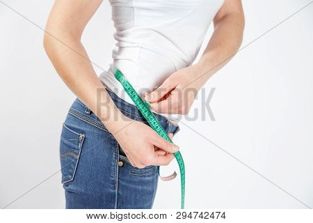 Woman Body After Weight Loss. Cropped Close Up Photo Of Fatless Slender Body Parts And Proportions W