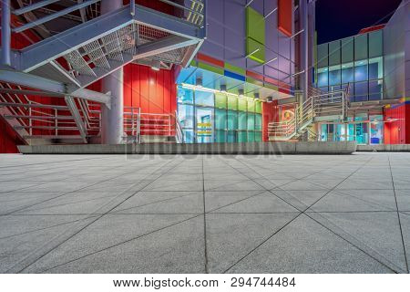 empty gound with modern building background at night, vancouver,canada.