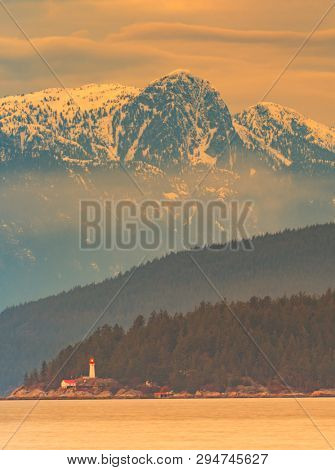 point atkinson lighthouse at sunset, vancouver, canada.