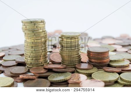 Stack Of Euro Cents Coins Of Different Value On White Background. Economy.