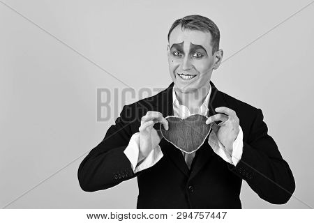 Big Hearted. Happy Mime Falling In Love. Mime Man Hold Red Heart For Valentines Day. Mime Actor With