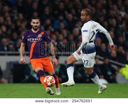 LONDON, ENGLAND: 09 MAR 2019. Ilkay Gundogan of Man City and Lucas of Tottenham compete for the ball  during the UEFA Champions League Quarter Final, First Leg match