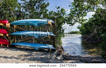 Florida Keys Canoe Launch:  Rental Canoes And Kayaks Wait Beside A Launch Area In Long Key State Par