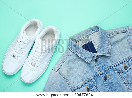 Retro Style Denim Stylish Jacket And White Hipster Sneakers On A Mint-colored Paper Background. Mini