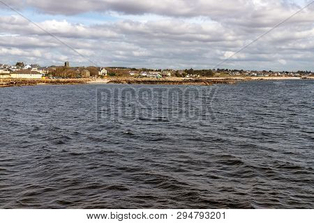 Beach With Sand And Buildings In Galway Bay