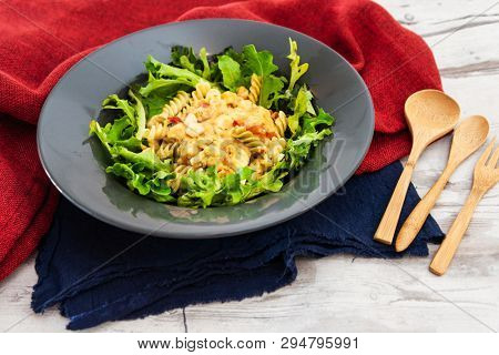 Salad made from radiatori cooked pasta, goat cheese and oil vinaigrette