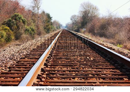 Railroad train tracks in the countryside near the small town of Bryan, Texas