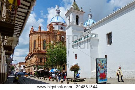 Cuenca, Ecuador- March 4, 2019: Flower Market Plaza (square) With View At New Cathedral Or Catedral 