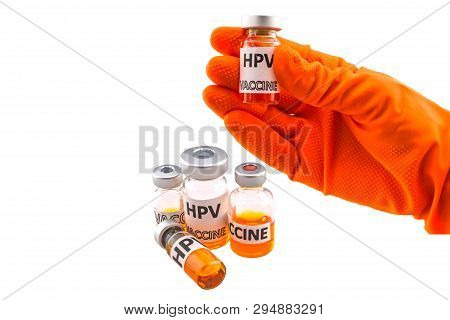 Hands Of The Doctor Filling A Vaccine Syringe And Bottle Vaccine Of Human Papillomavirus (hpv) Vacci
