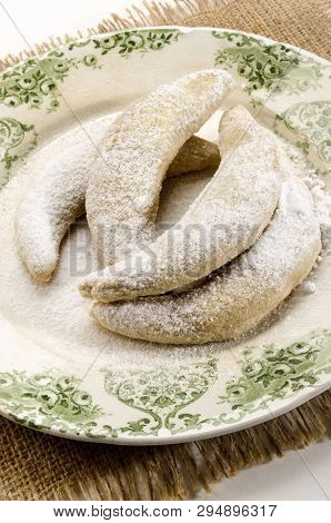 Classic Vanilla Kipferl, Traditional German Cookies With Powdered Sugar On A Plate