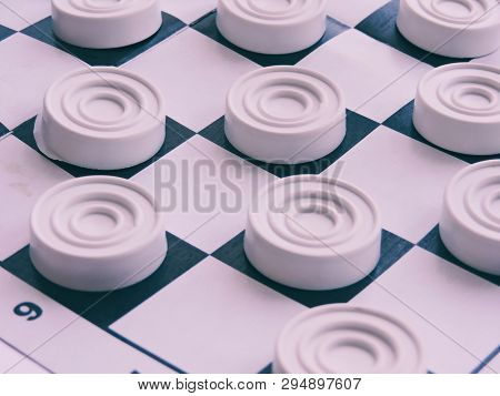 Checkerboard With Checkers. Business Strategy Competition, Strategic Planning For Winning Success. H