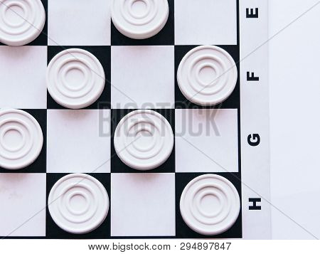 Checkerboard With Checkers. Business Strategy Competition, Strategic Planning For Winning Success. H