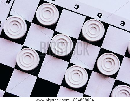 Checkerboard With Checkers. Business Strategy Competition, Strategic Planning For Winning Success. H